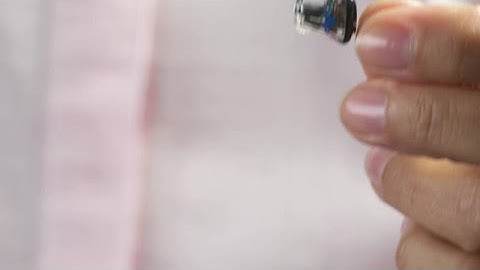 Remove Invisible-In-Canal hearing aid with removal string