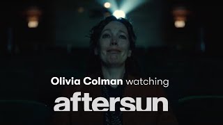 Olivia Colman watching the 