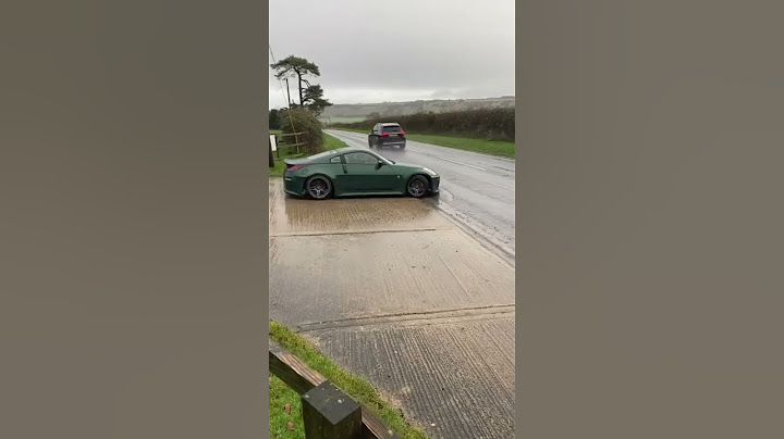 Nissan 350z struggles to leave meet 😂 #carfest #ferraridiecast #supercar #redferrari #2jz #nissan