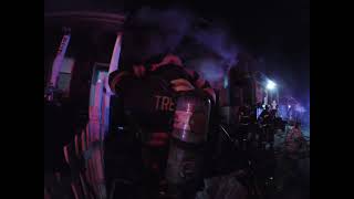 Multiple alarm 4 houses on fire. Evacuation ordered. Breaching walls to access fire.