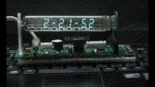 IV-18 VFD Clock,  with 3 alarms, thermometer and calculator!