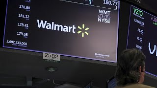 Walmart Shares Hit Record After It Raises Outlook | Reuters