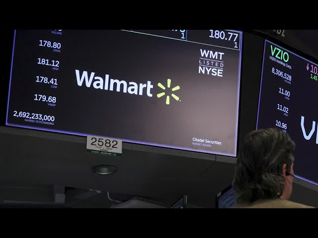 Walmart shares hit record after it raises outlook | REUTERS