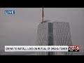 Crews to install logo on Mutual of Omaha Tower