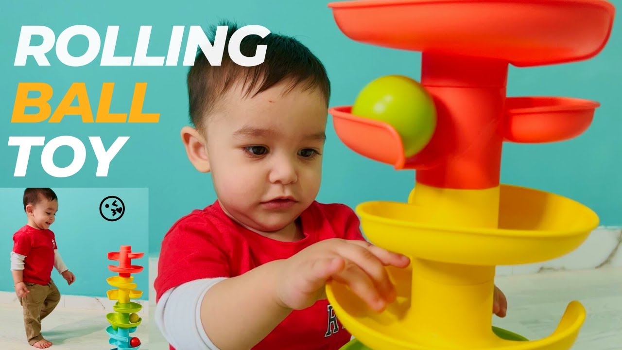 Baby Plays with Spinning Ball Toy YouTube