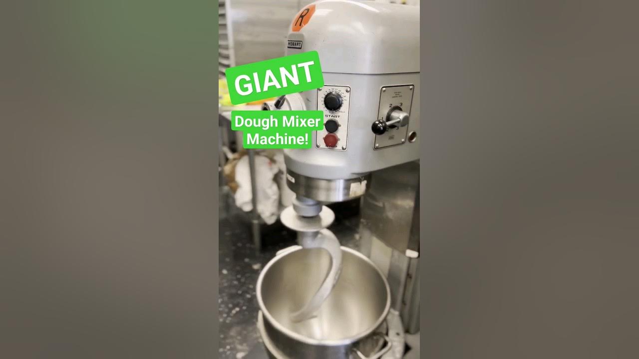 Closeup Of Industrial Dough Mixing Machine For Kneading With Open