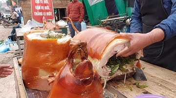 ĐẶC SẢN LỢN QUAY TẠI HỘI CHỢ  PHONG VÂN LỤC NGẠN BẮC GIANG