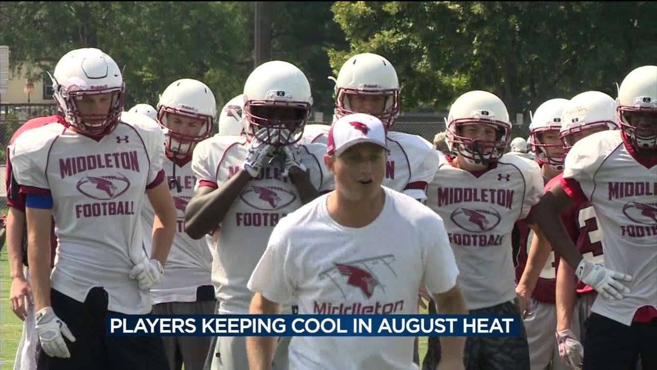 High School Football Players Staying Cool During Practices