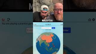 Playing Globle With Big Cat