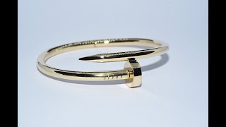 "A clou" handmade, 18KT gold bracelet in the shape of a nail.