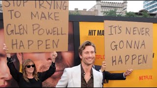 Glen Powell's Parents Hilariously Troll Him At 'Hit Man' Premiere