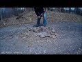 Removing the top of a boulder in a driveway using a torch