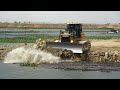 Good Lake Filling up Project Machinery Power Shantui Bulldozer & Dump Truck Spreading Dirt Extreme