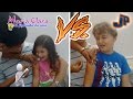 Maria Clara e JP tomando vacina