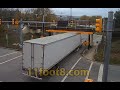 Semi truck gets fairing stuck at the 11foot8+8 bridge