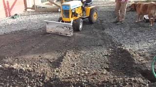 Granpa Teaching Grandkids To Move Dirt With A Cub Cadet 123