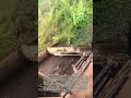 側面ブレード作業 : ブルドーザーの運転席から見た農道の土押し作業