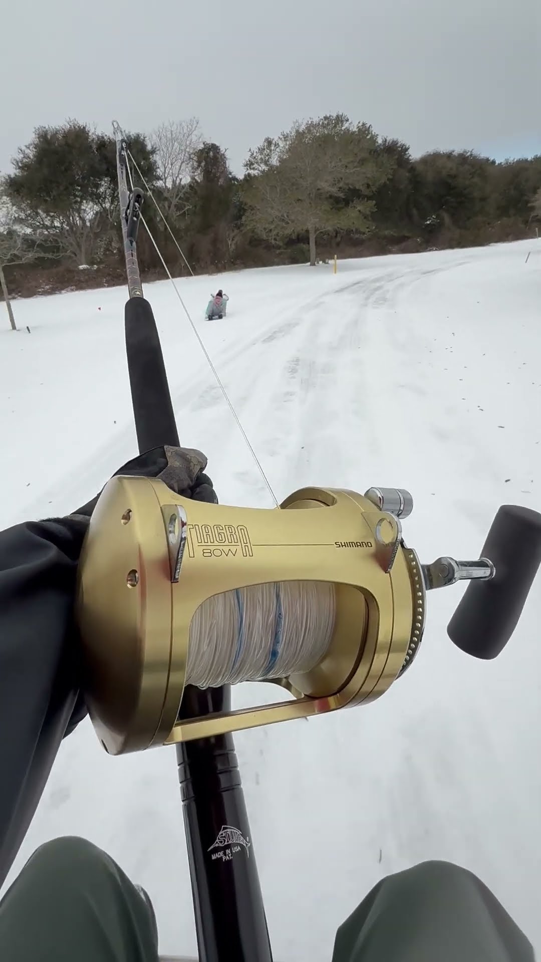 Woman Goes Sledding With Boogie Board And Fishing Pole || ViralHog
