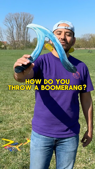 How do you throw a boomerang?