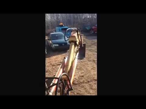 Backhoe boom lift after re building backhoe control valve and secondary relief valves.