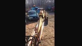 Backhoe boom lift after re building backhoe control valve and secondary relief valves.