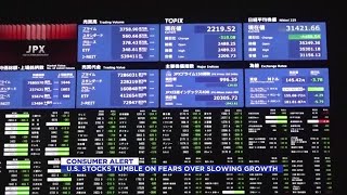 U.S. stocks tumble on fears over slowing growth