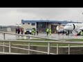 Climate change activists make way onto tarmac at hanscom field