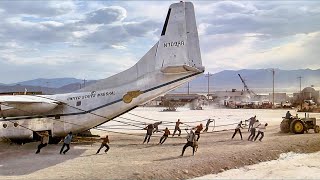 Prisoners Forced to Pull a 150-Ton Plane Out of the Sand to Escape the Police.