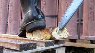 Chainsaw, bread and black rubber boots