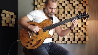 Cenk Erdogan Plays Marchione Fretless Electric Guitar chords