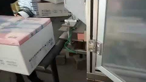 Film wrapping machine for A4 paper pack