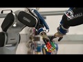 Solving The Rubik&#39;s Cube with Two Industrial Robots