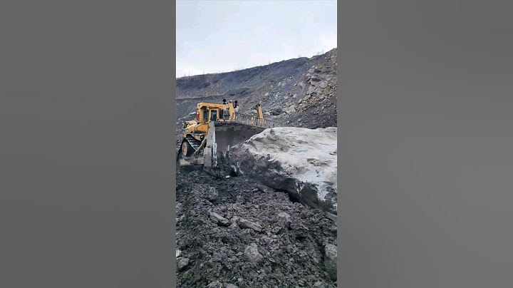 CAT D11 vs ROCK!