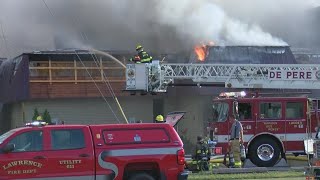 De Pere church and restaurant recover year after fire
