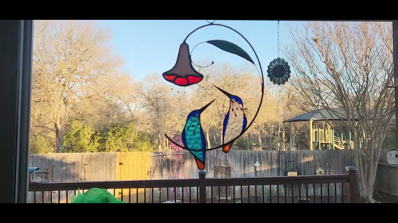 Extend the hummingbird season with this stained glass hanging!