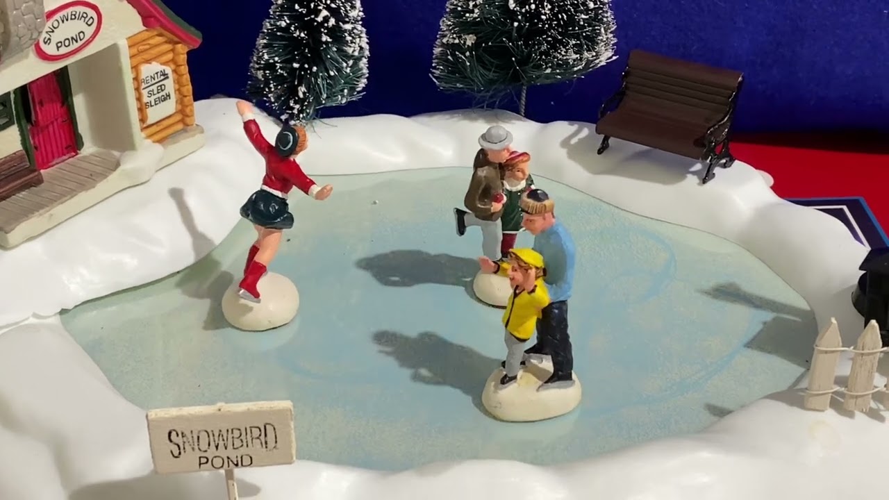 Lemax animated skating pond with accessories