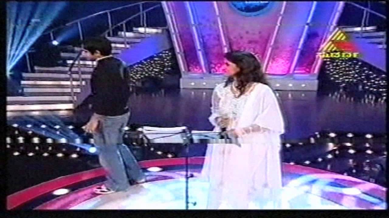 Dr Shamitha Malnad with singer Karthik  in  "confident star singer" {Tv show}