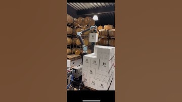 Robot palletizing cartons of wine! #robotics #innovation #technology