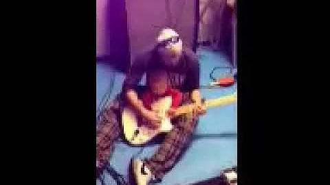 One year old plays guitar with Dad