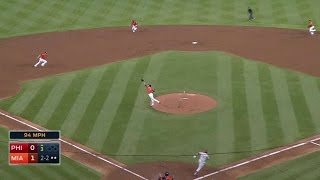 PHI@MIA: Cosart jumps to snare bouncer off the mound