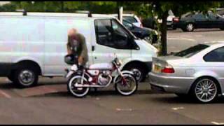 old man on motorcycle