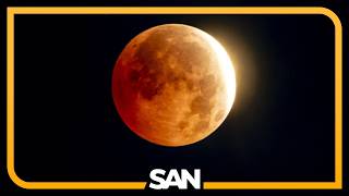 Skywatchers get a dramatic look at a moon almost fully eclipsed