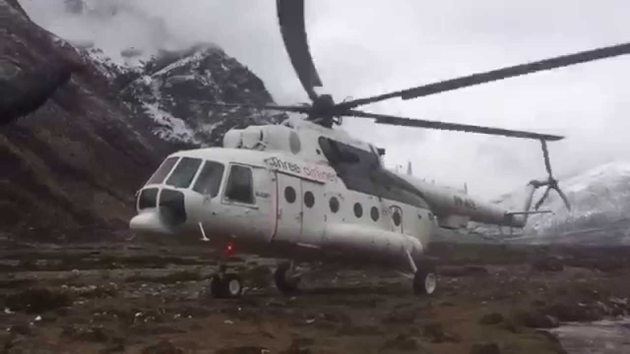 Climbers injured at Everest Base Camp are evacuated by a Russian Mi-17