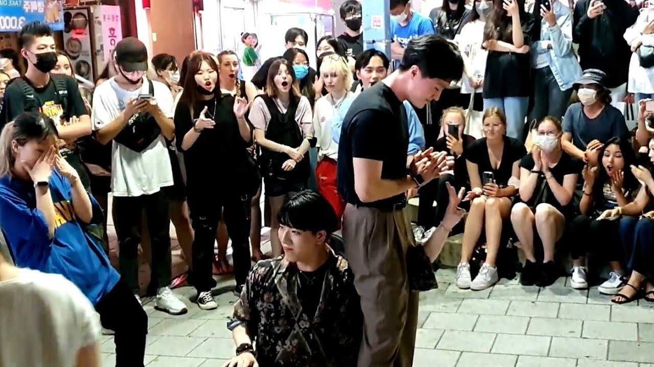 FRIDAY. RED CREW. EXHILARATING IMPROMPTU INTERACTIVE BUSKING WITH ONLOOKER. HONGDAE STREET.