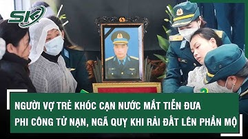 NGƯỜI VỢ TRẺ KHÓC CẠN NƯỚC MẮT TIỄN ĐƯA PHI CÔNG TỬ NẠN, NGÃ QUỴ KHI RẢI ĐẤT LÊN PHẦN MỘ CHỒNG