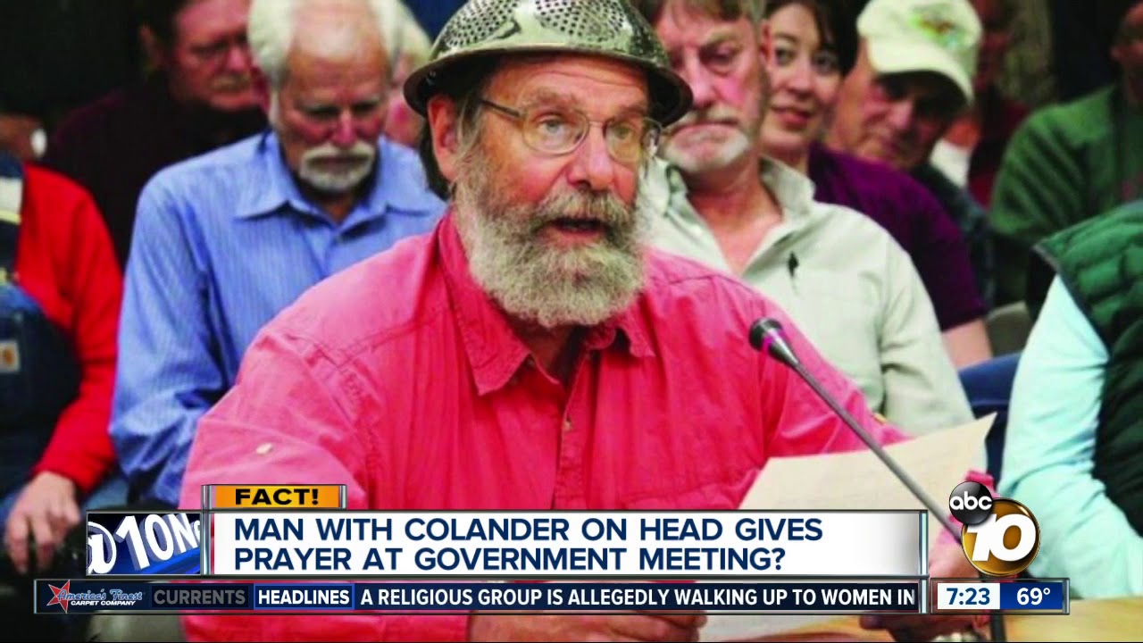 Man with strainer on head gives opening prayer? YouTube