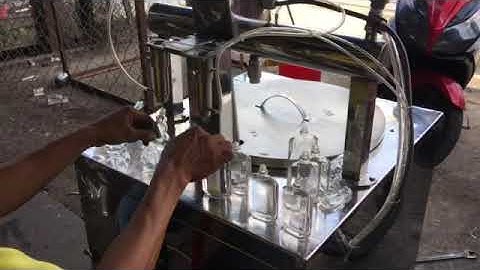 Máy chiết rót dầu gió, kiểu chiết hút chân không, nhanh và đạt độ chính xác tuyệt đối. 0909618949