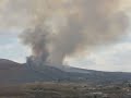 Black smoke obscures the big "E" on Elko Mountain