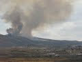 Black smoke obscures the big "E" on Elko Mountain