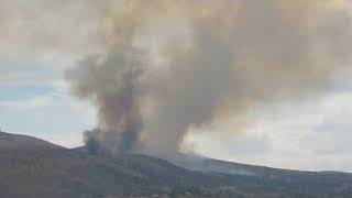 Black smoke obscures the big "E" on Elko Mountain